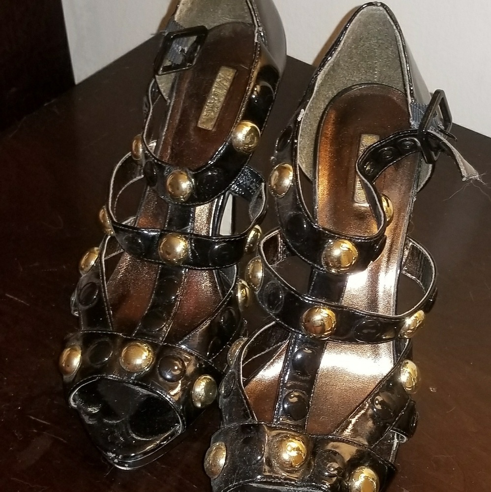 Black and gold cutout heels