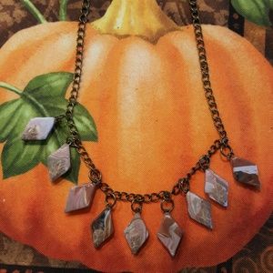 Hand carved clay necklace