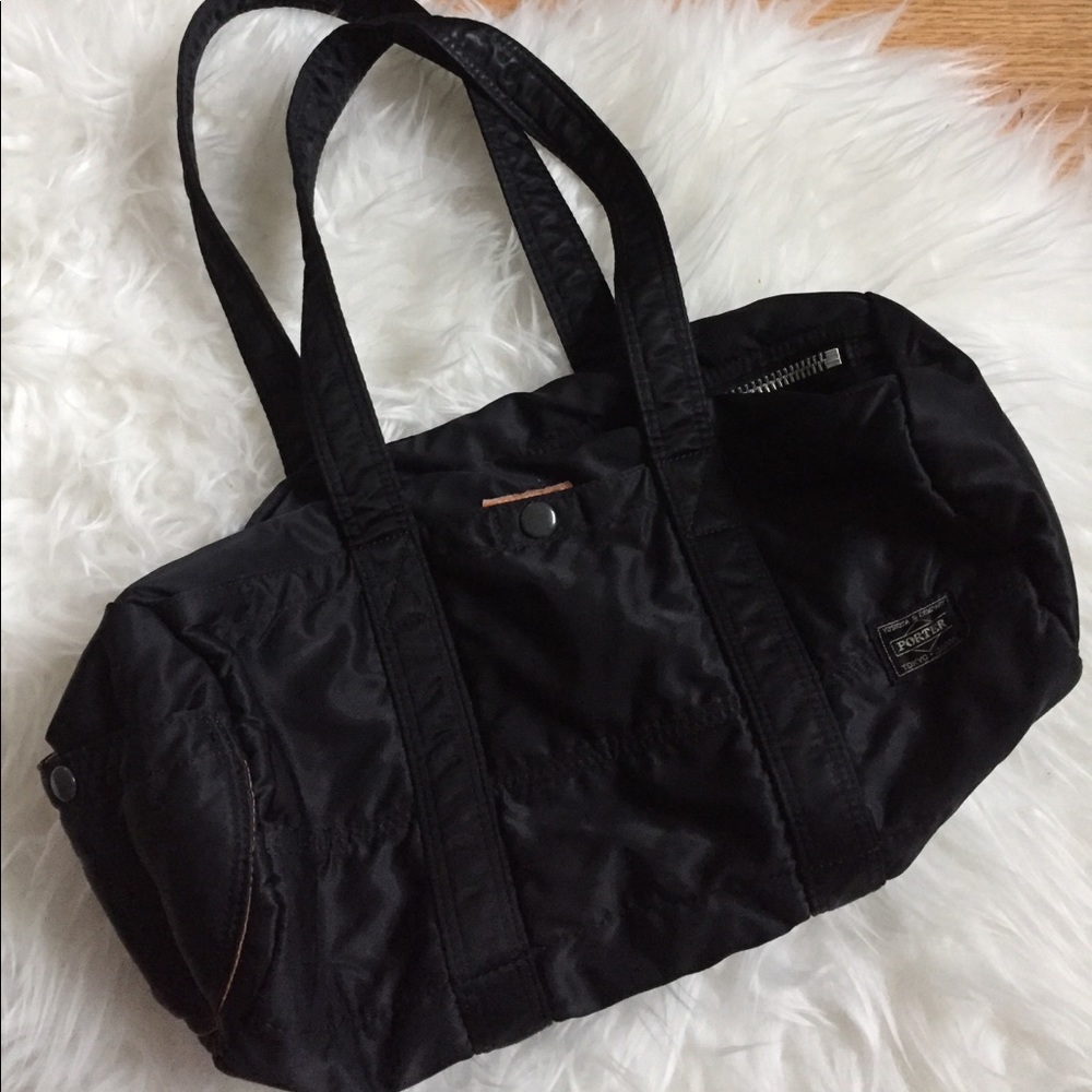 Porter Tokyo bag cylinder shape black pockets