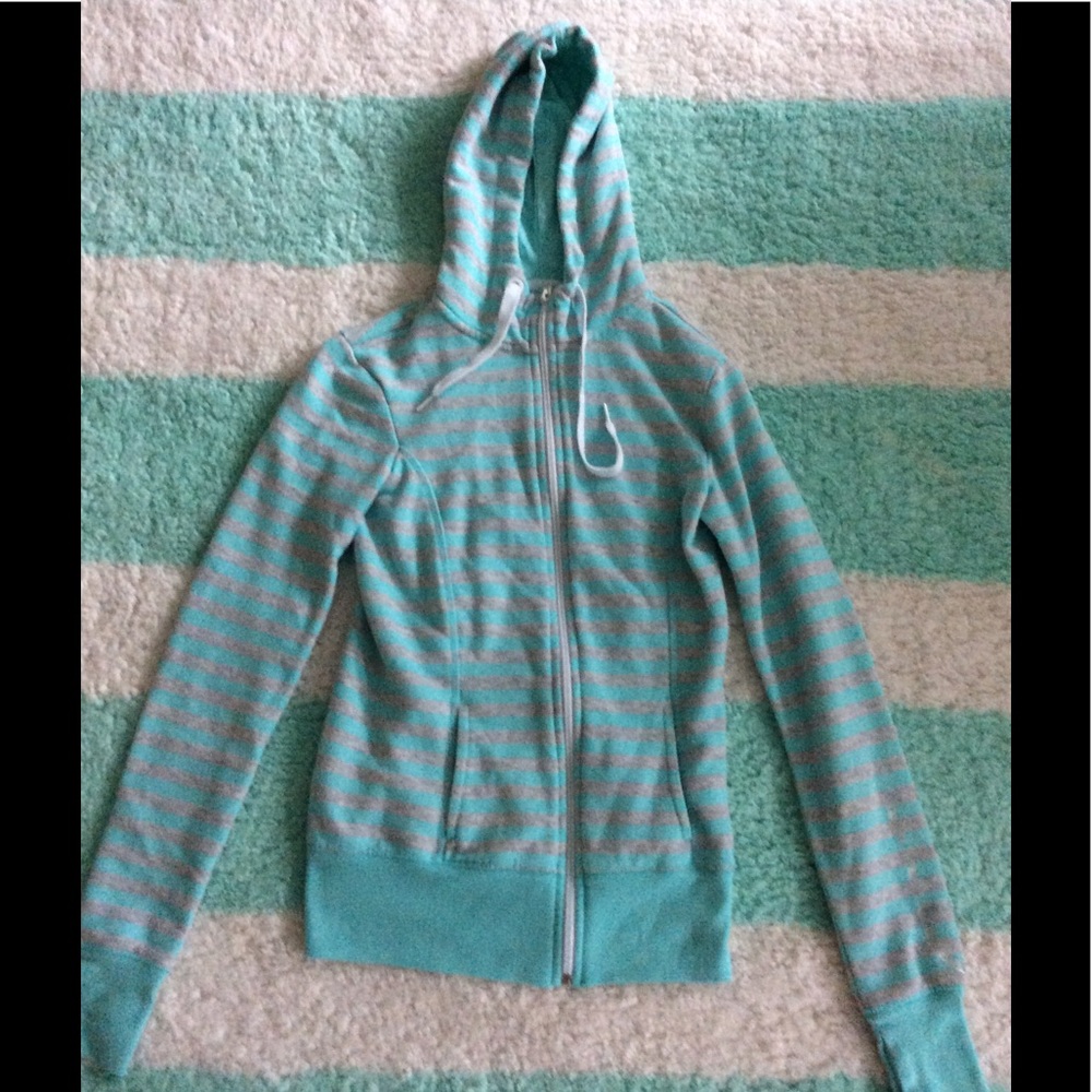 Mint green and gray striped, zipper up sweatshirt.