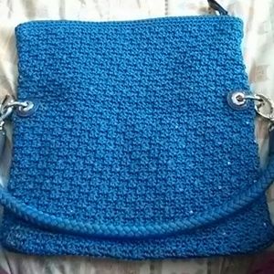 This is a blue the sak purse