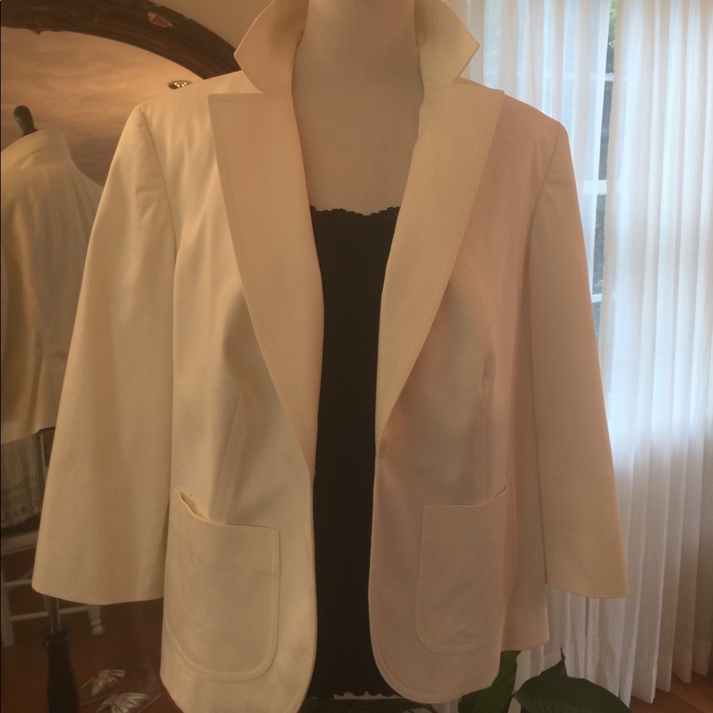 Crisp, white one button blazer.