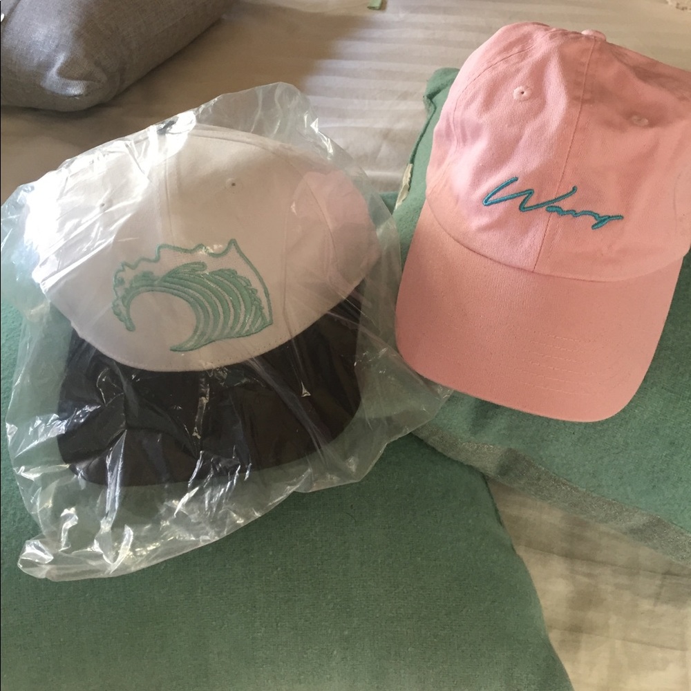 Two new women baseball caps.