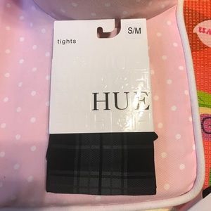 Hue black patterned tights.