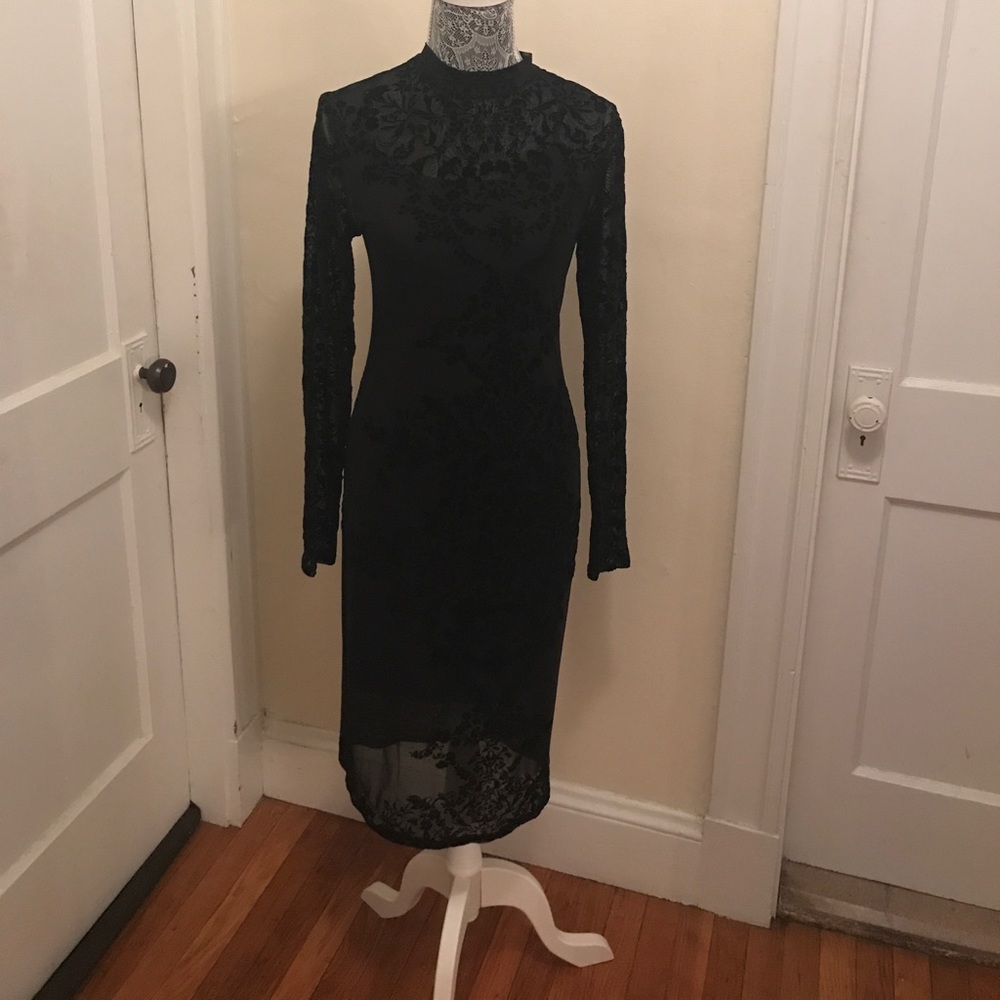 Lace black long sleeved dress. Never worn