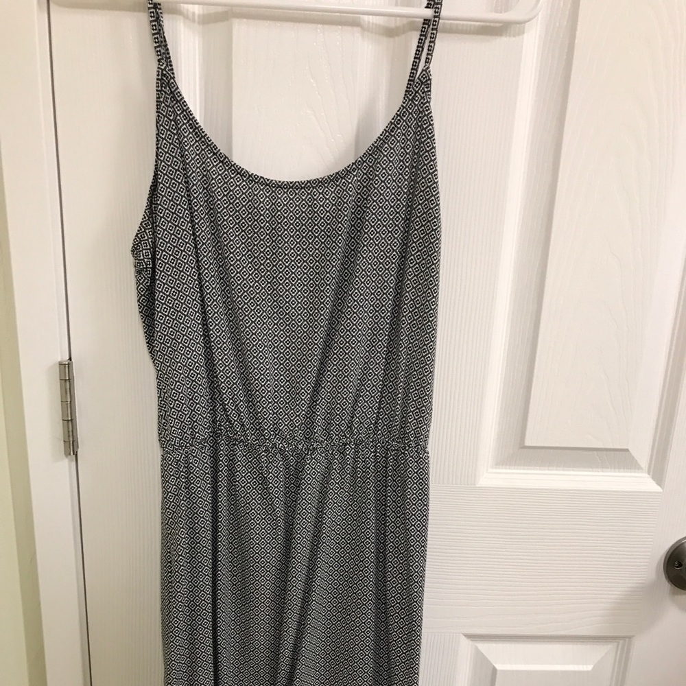 Knee length white and black patterned dress.