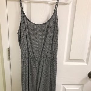 Knee length white and black patterned dress.