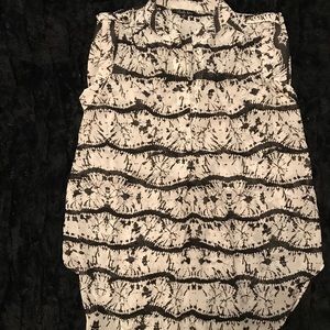 Black and white sleeveless blouse