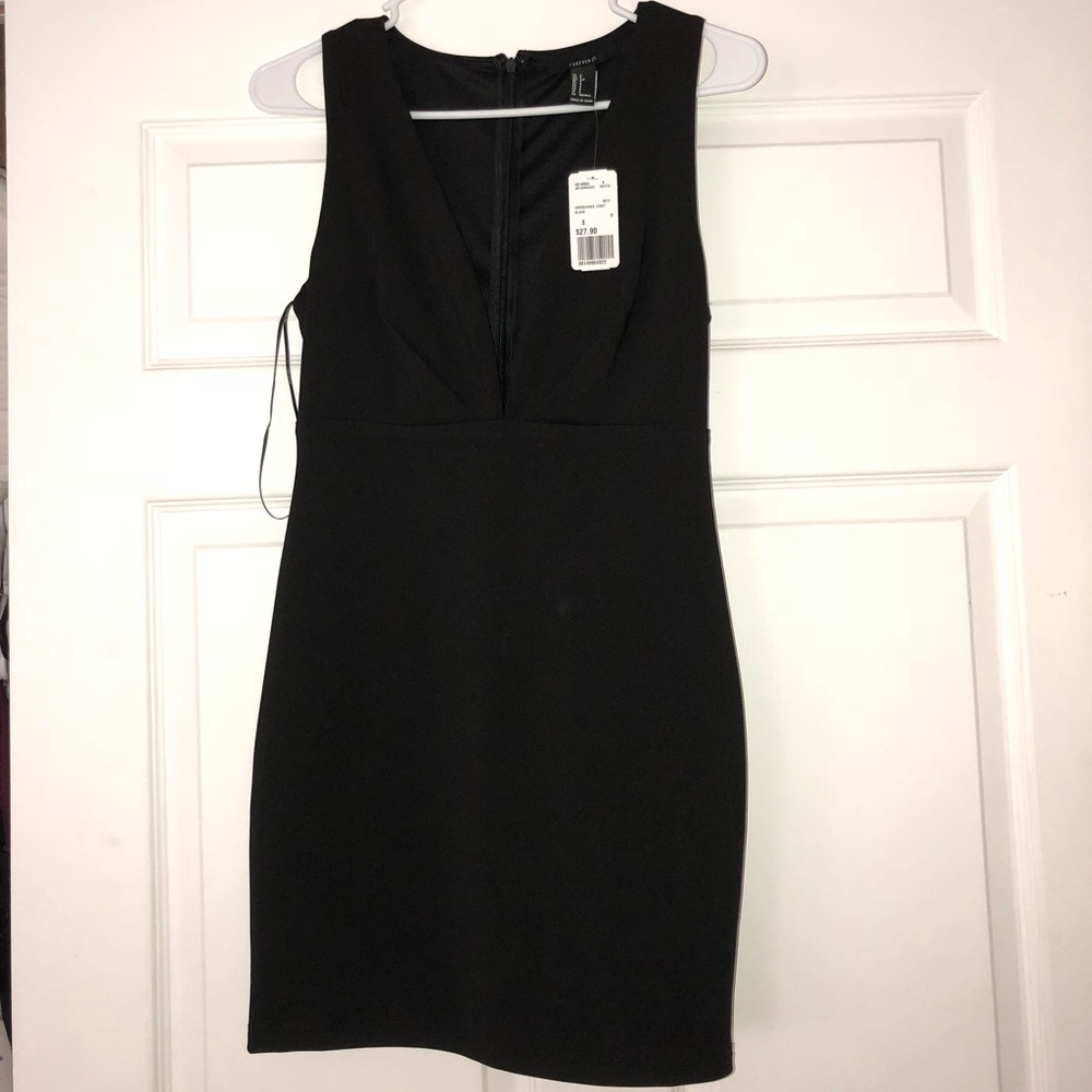 Deep neck line black dress