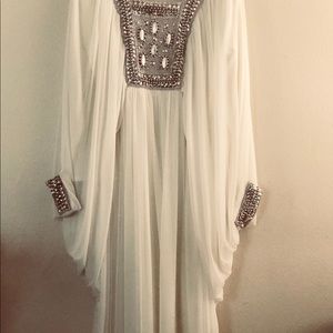 Women white and silver long dress.
