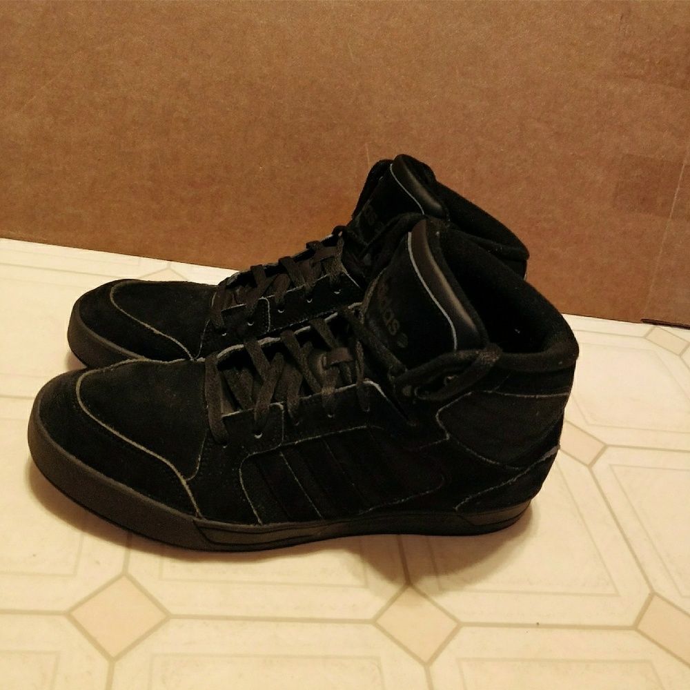 All black Adidas hightops