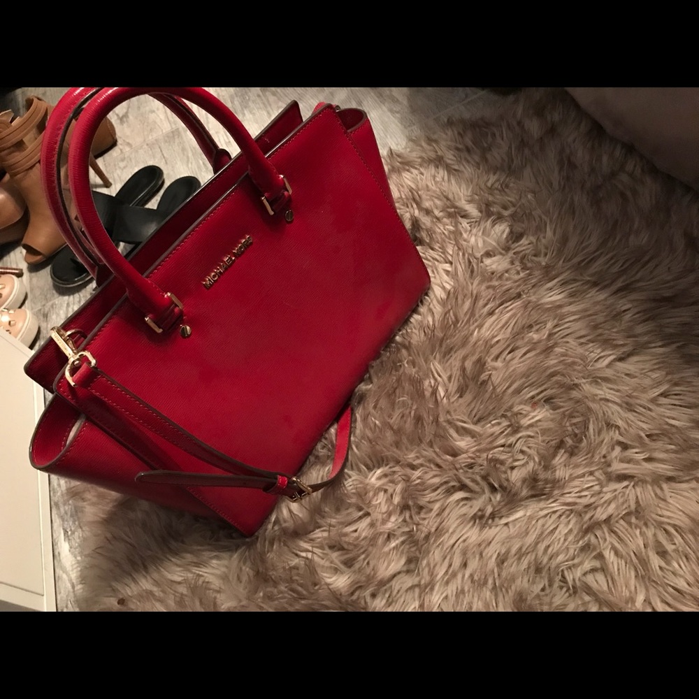 Brand new Michael Kors “Selma” purse in Cherry