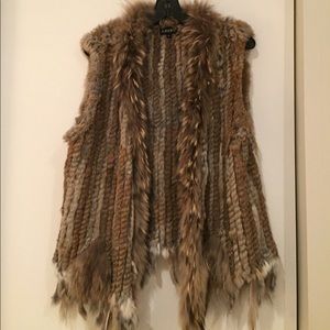 Adore short real fur vest with tassel detail