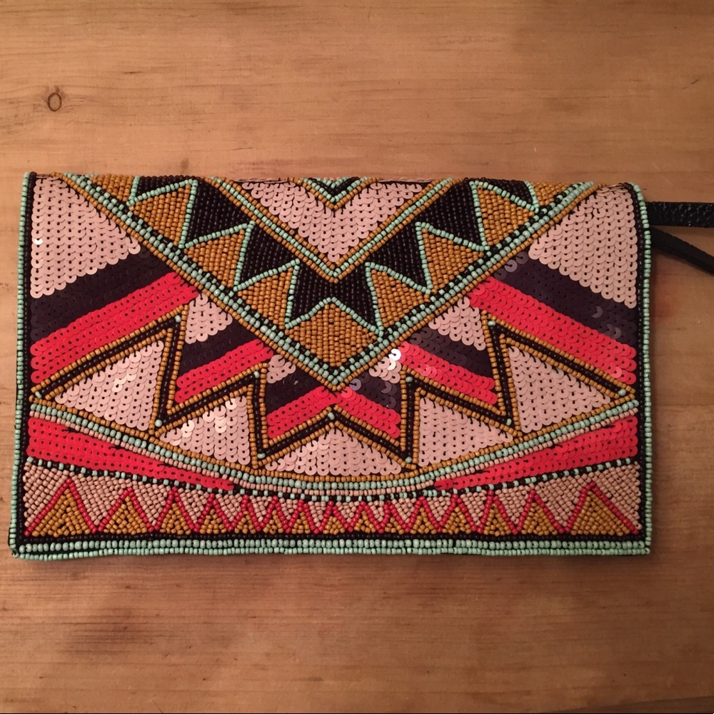 BCBG generation beaded/leather clutch NWT