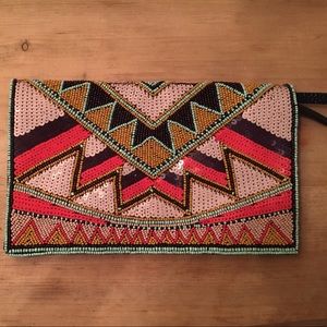 BCBG generation beaded/leather clutch NWT