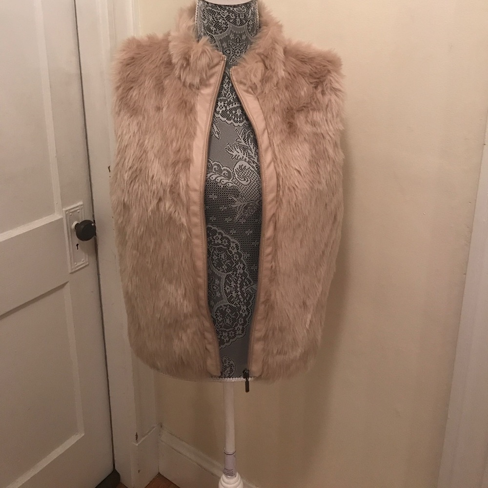Faux fur zip up vest. Never worn