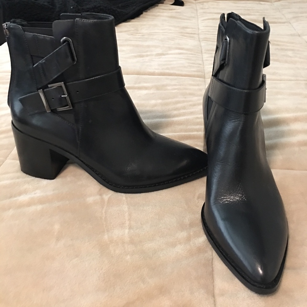 Black leather Kenneth Cole ankle booties.