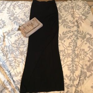 Black maxi skirt with a high slit