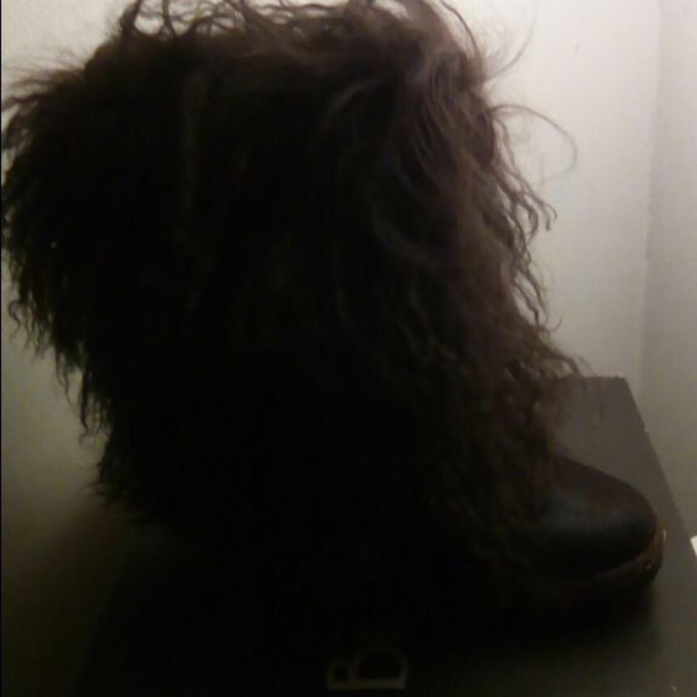 Mongolian hair boots and vest.