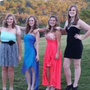 Selling my coral jeweled homecoming dress .