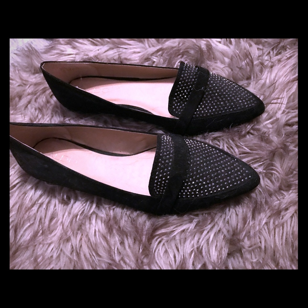 Black studded pointed toe flats