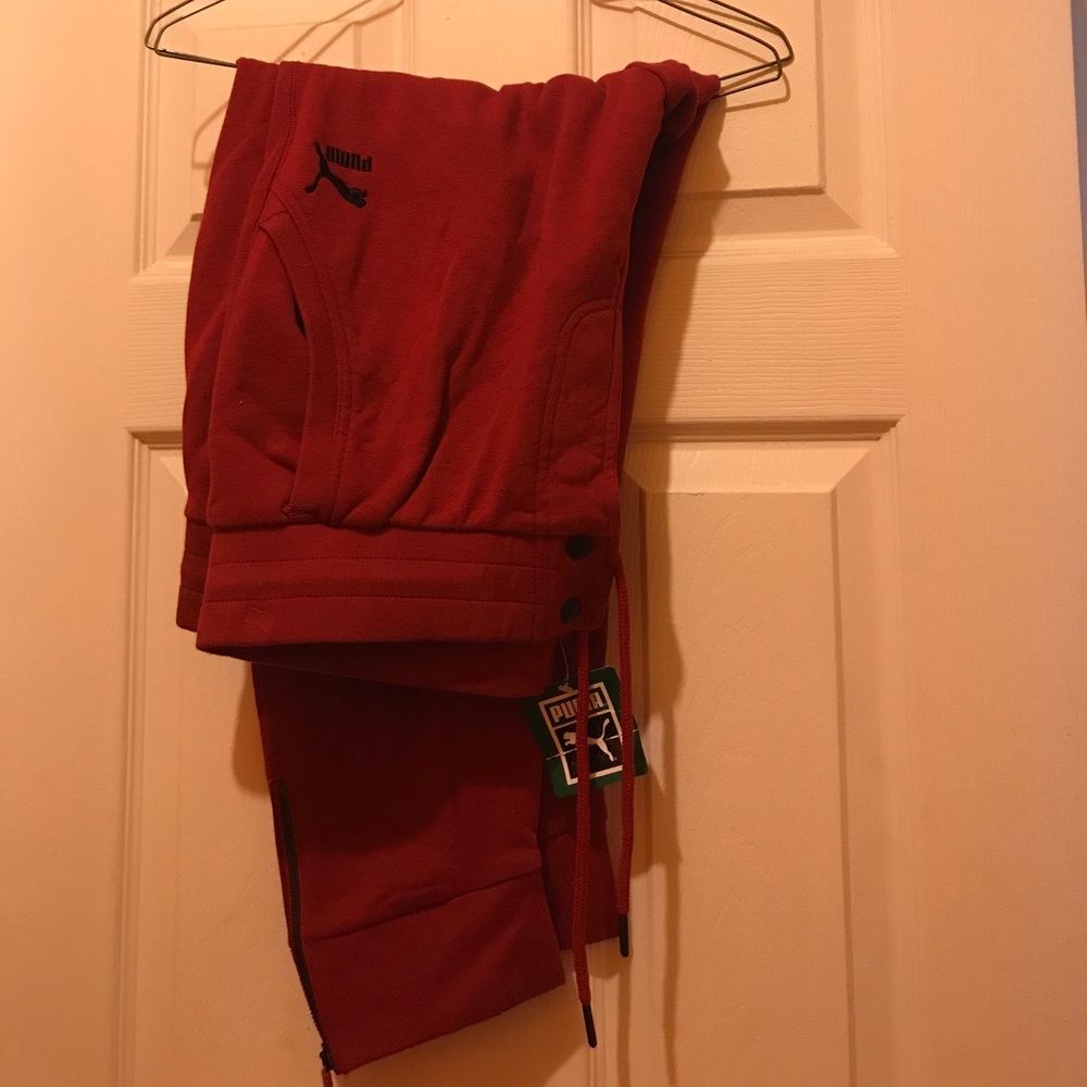 Zipper bottom pants , maroon colored .