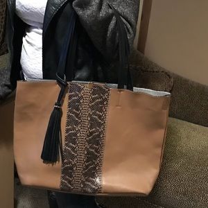 Brown purse with black design