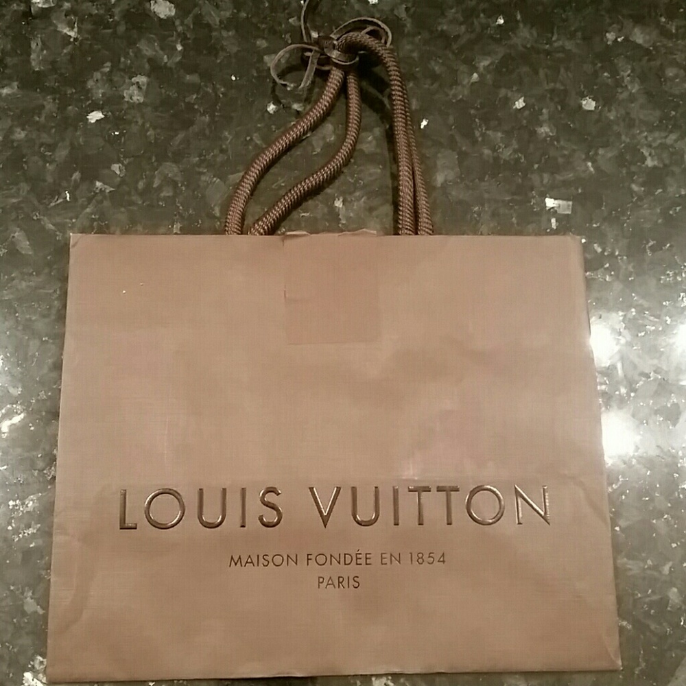 Auth. Louis vuitton shopping bag.