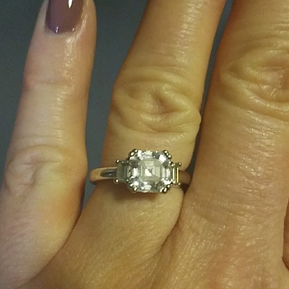 Diamonique 14 karat white gold ring.