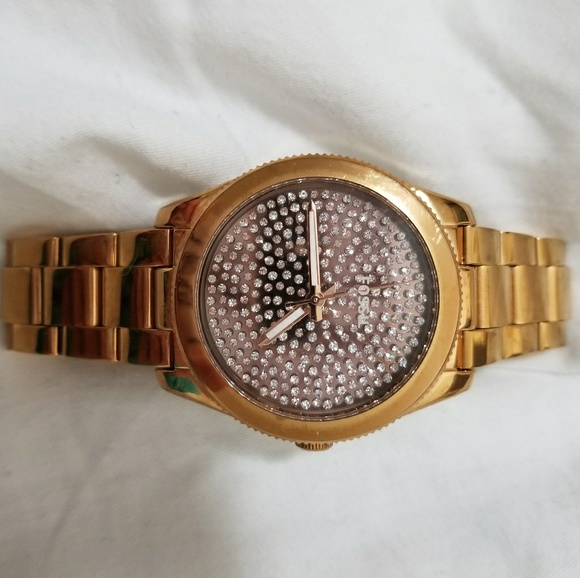 Gold crystal face fossil watch