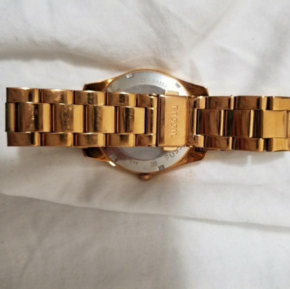 Gold crystal face fossil watch