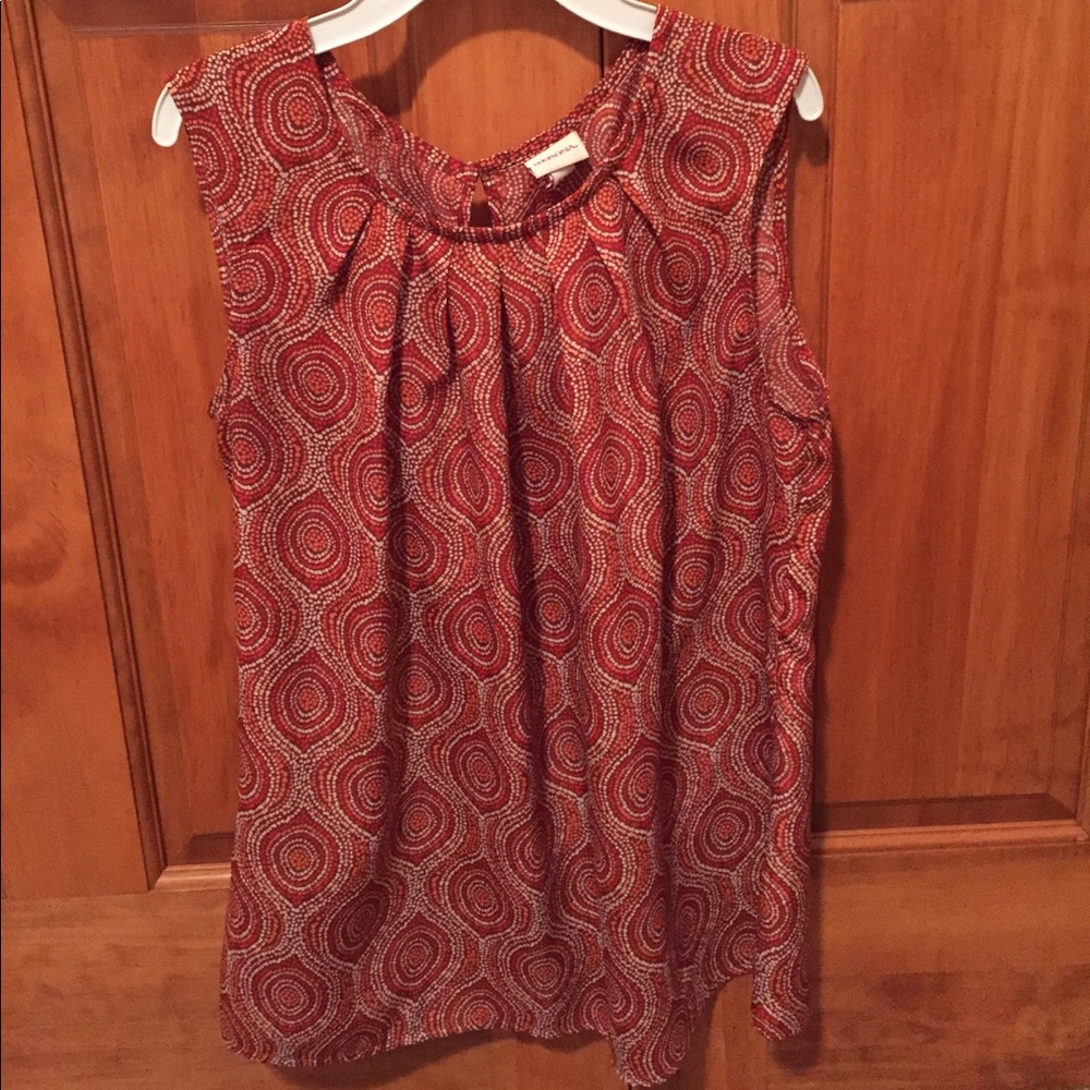 Red sleeveless blouse