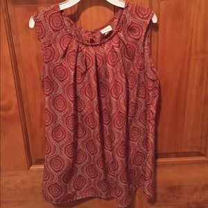 Red sleeveless blouse