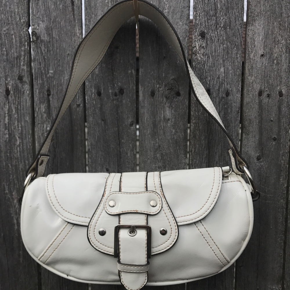 White clutch with magnetic closure.