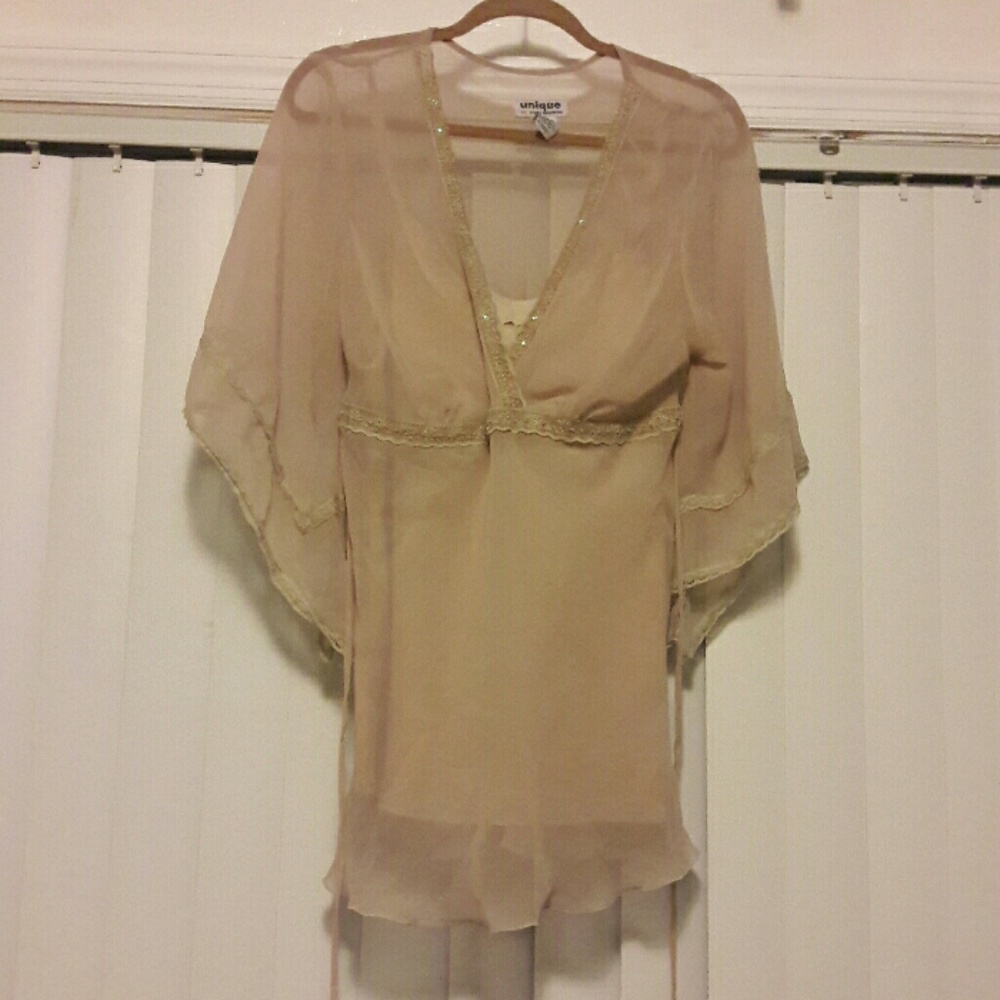 Ladies fashion blouse.  100% polyester.