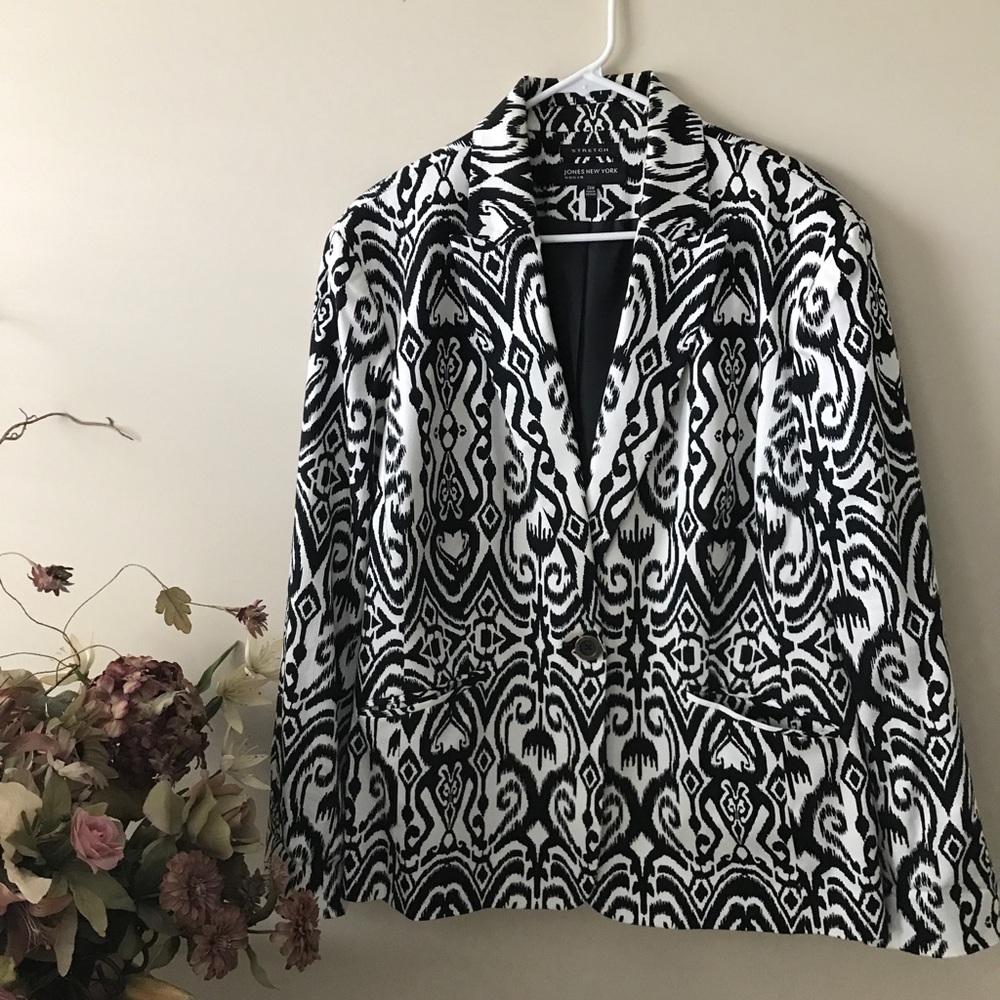Black and white patterned blazer.