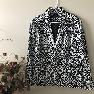 Black and white patterned blazer.