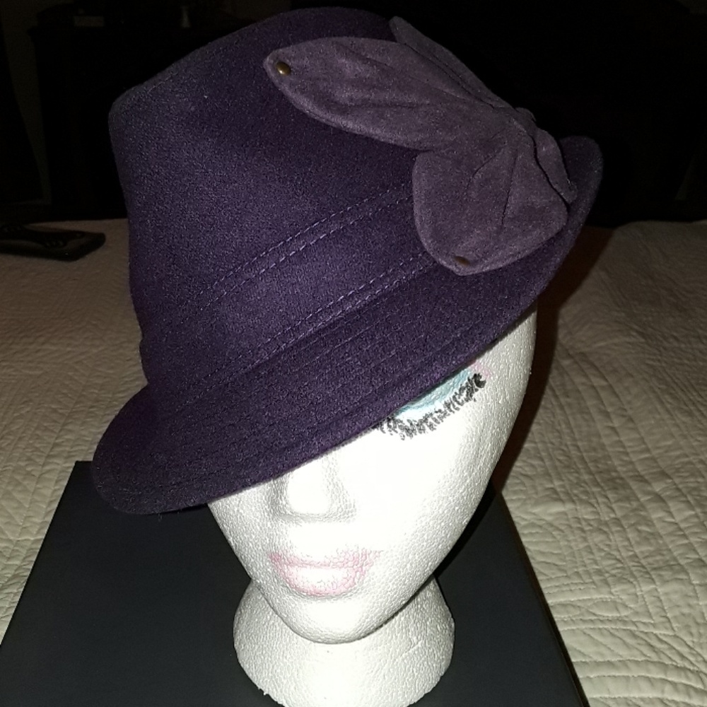 Purple fedora w/ flower applique on the side.