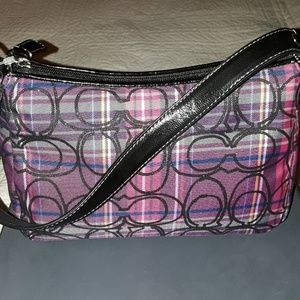 Brand new tags still on Coach handbag