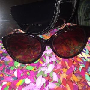 Tortious framed slight cat eye sunglasses