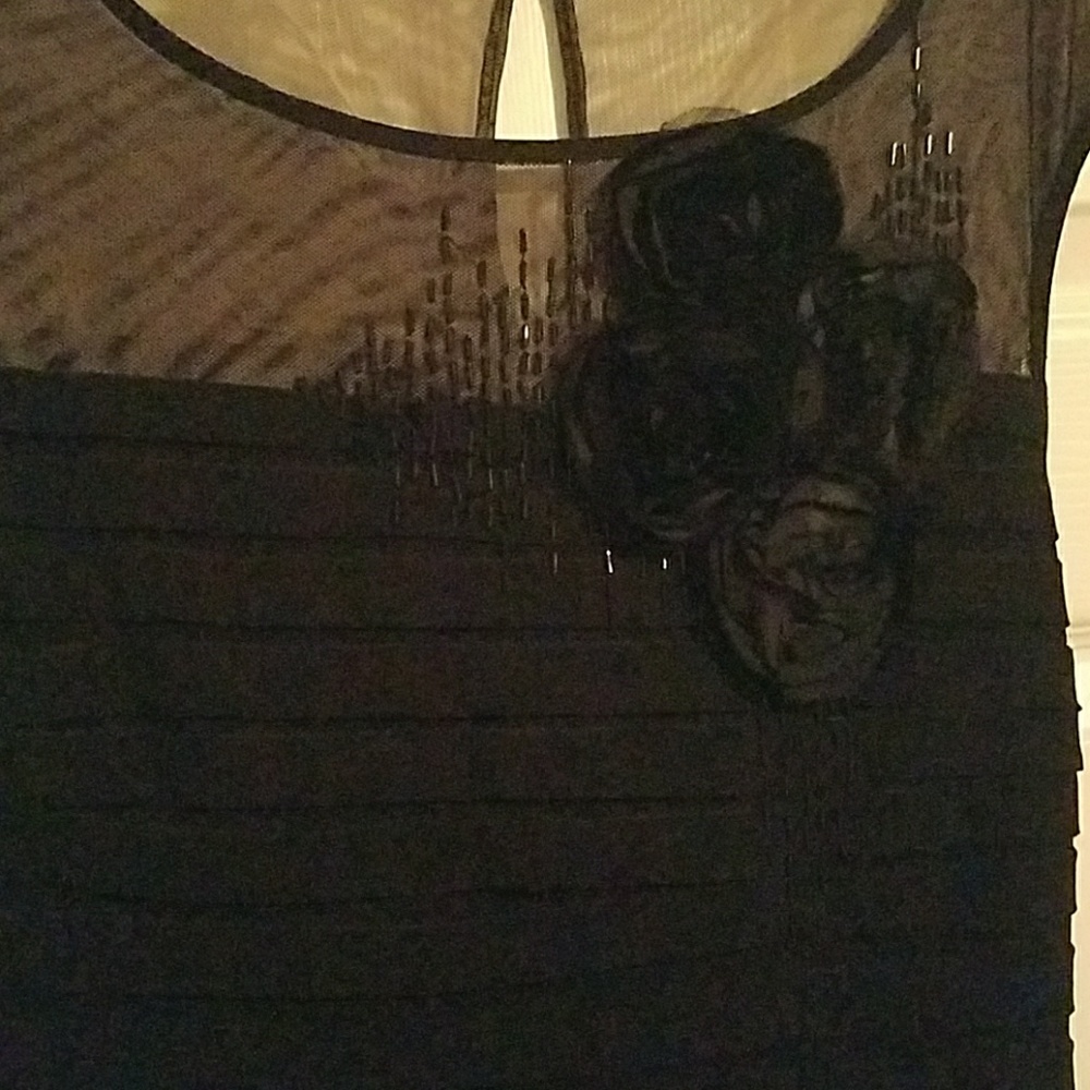 Stunning black dress perfect for the holidays!