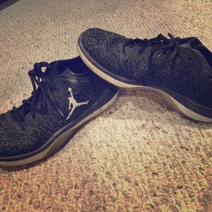black low top jordans