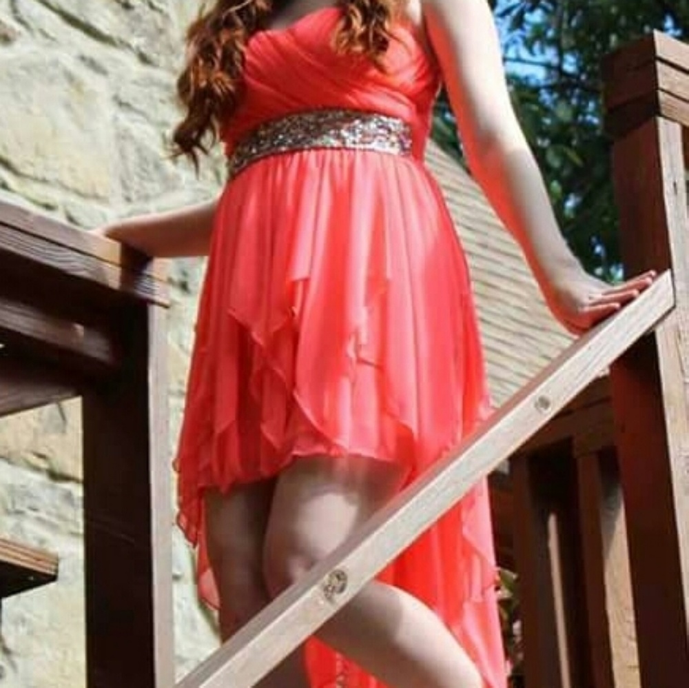 Salmon colored high and low dress