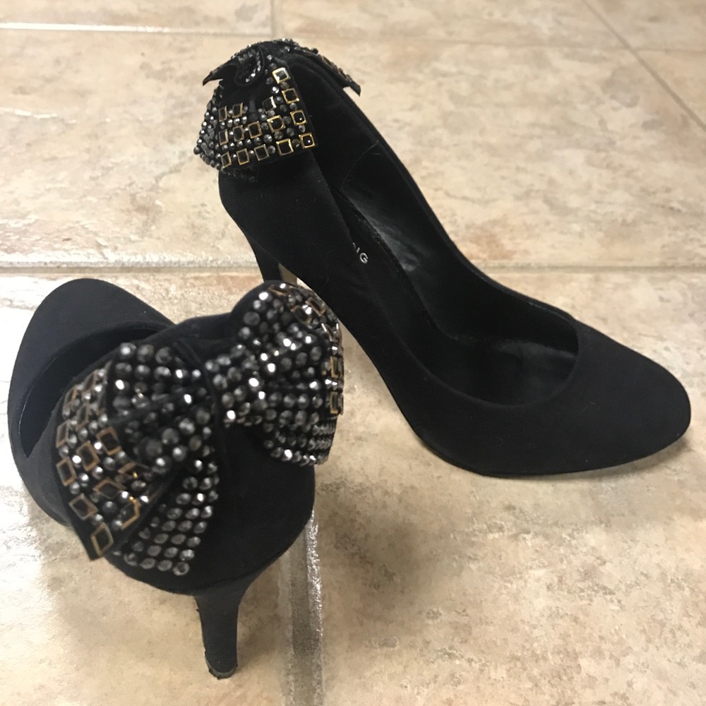 Black heels with bow on back