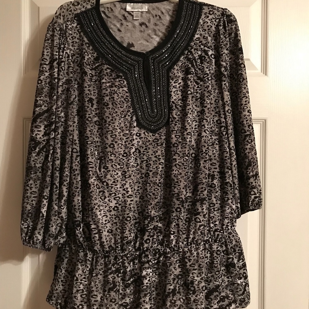 Women’s animal print peplum top 1X