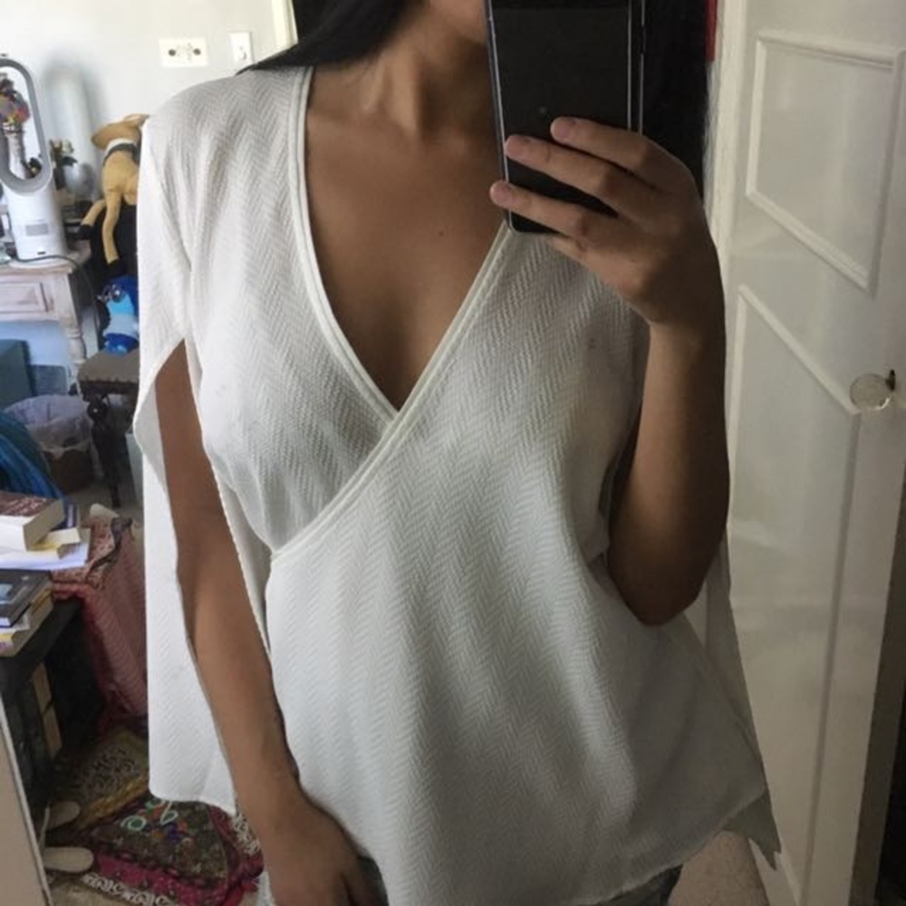 Beautiful we are kindred wrap around white blouse