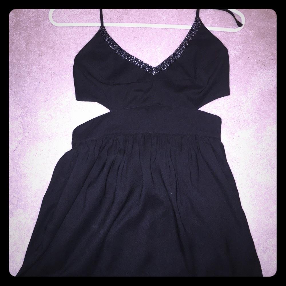 Black flowy dress with side cut outs