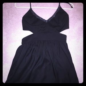 Black flowy dress with side cut outs