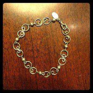 Silver swirl design bracelet