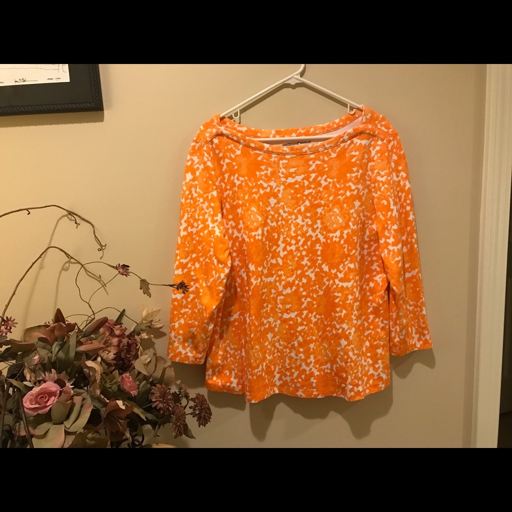 Orange and white 3/4 sleeve tee.